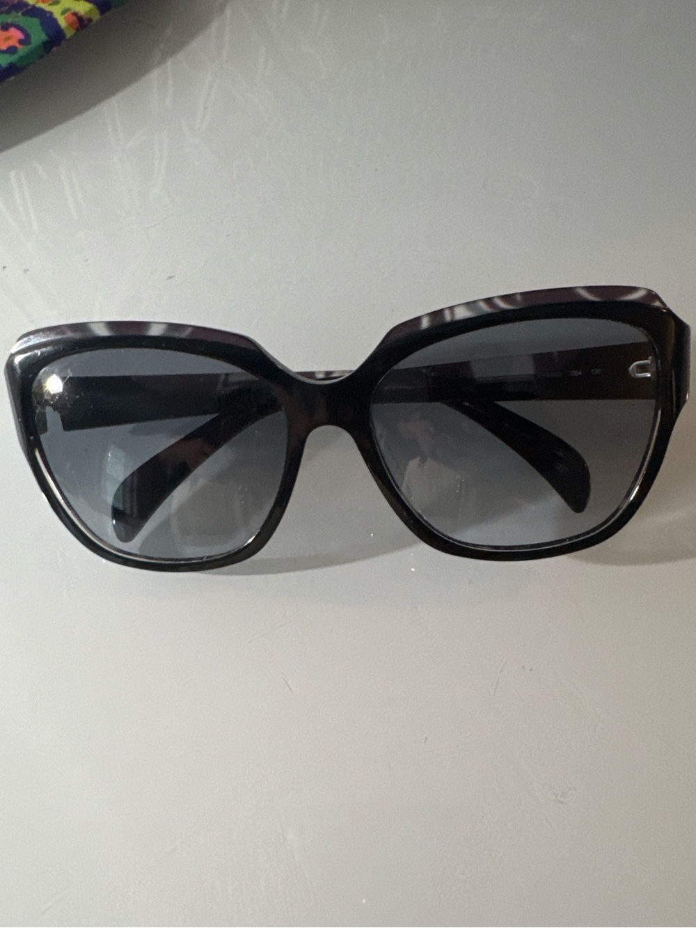 Emilio Pucci Black Frame Sunglasses with Dark Lenses